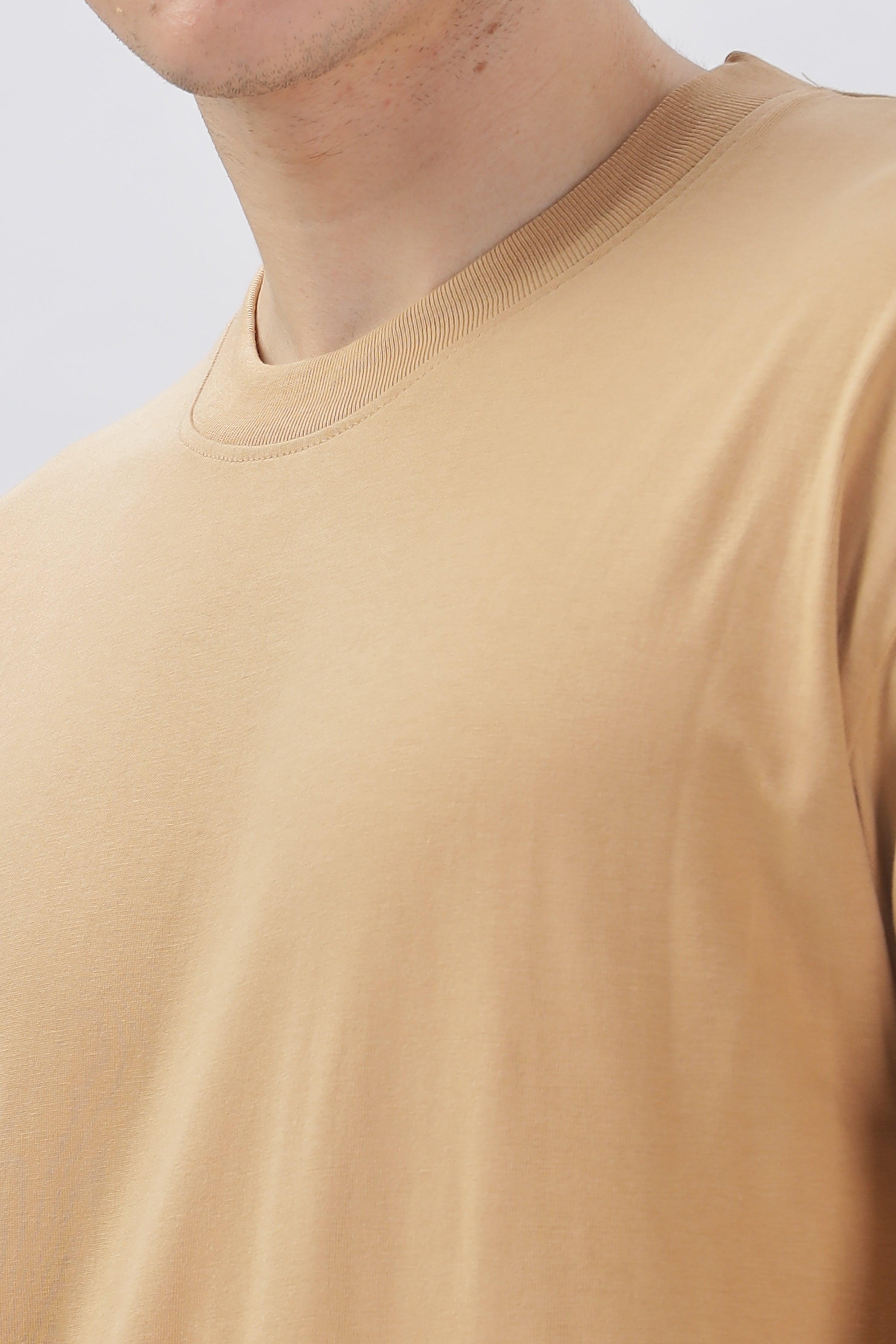 Soulmonk taupe oversized t-shirt worn by male model showing crew neckline and relaxed fit