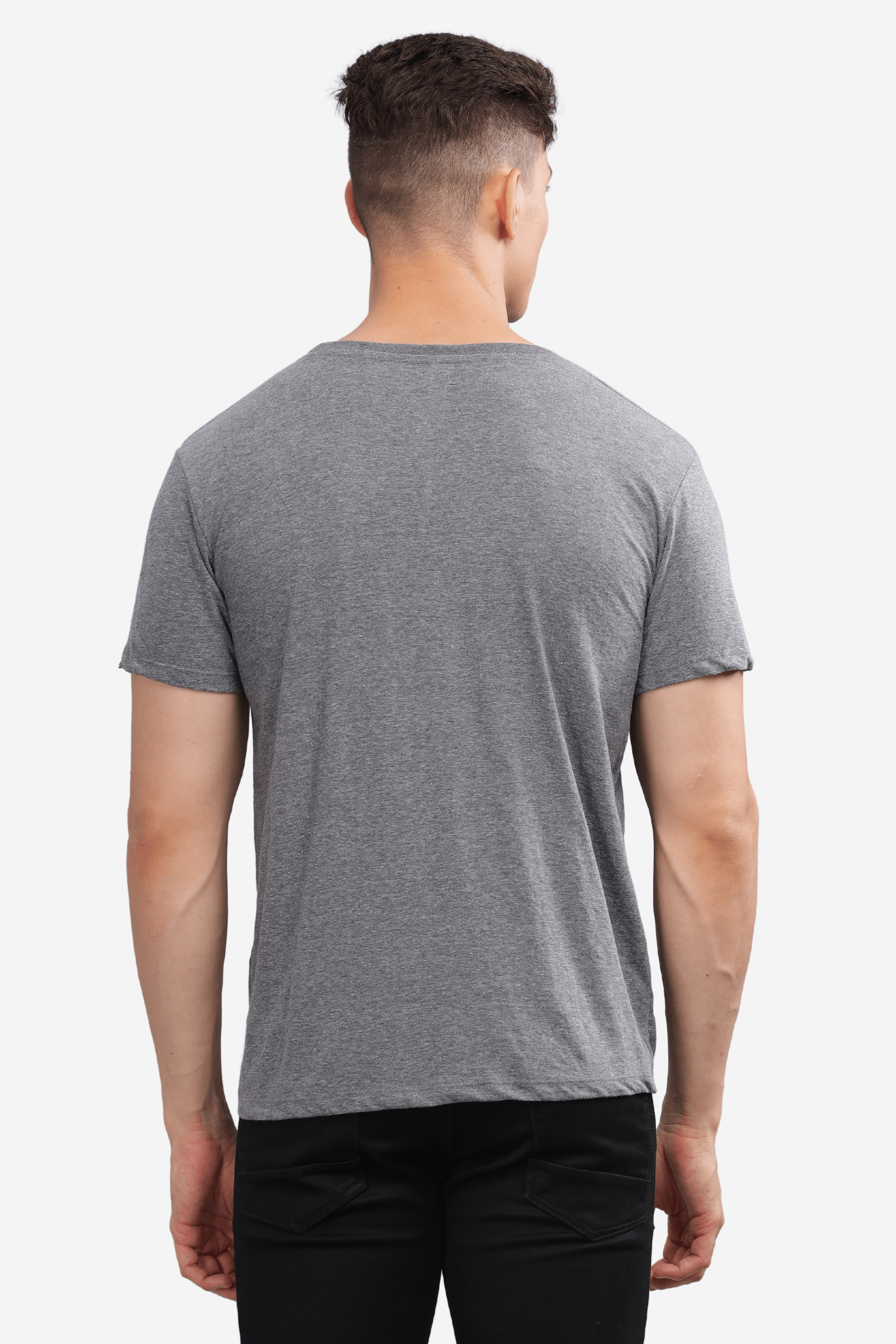 Male model wearing a dark grey relaxed fit t-shirt by Soulmonk, shown from the back
