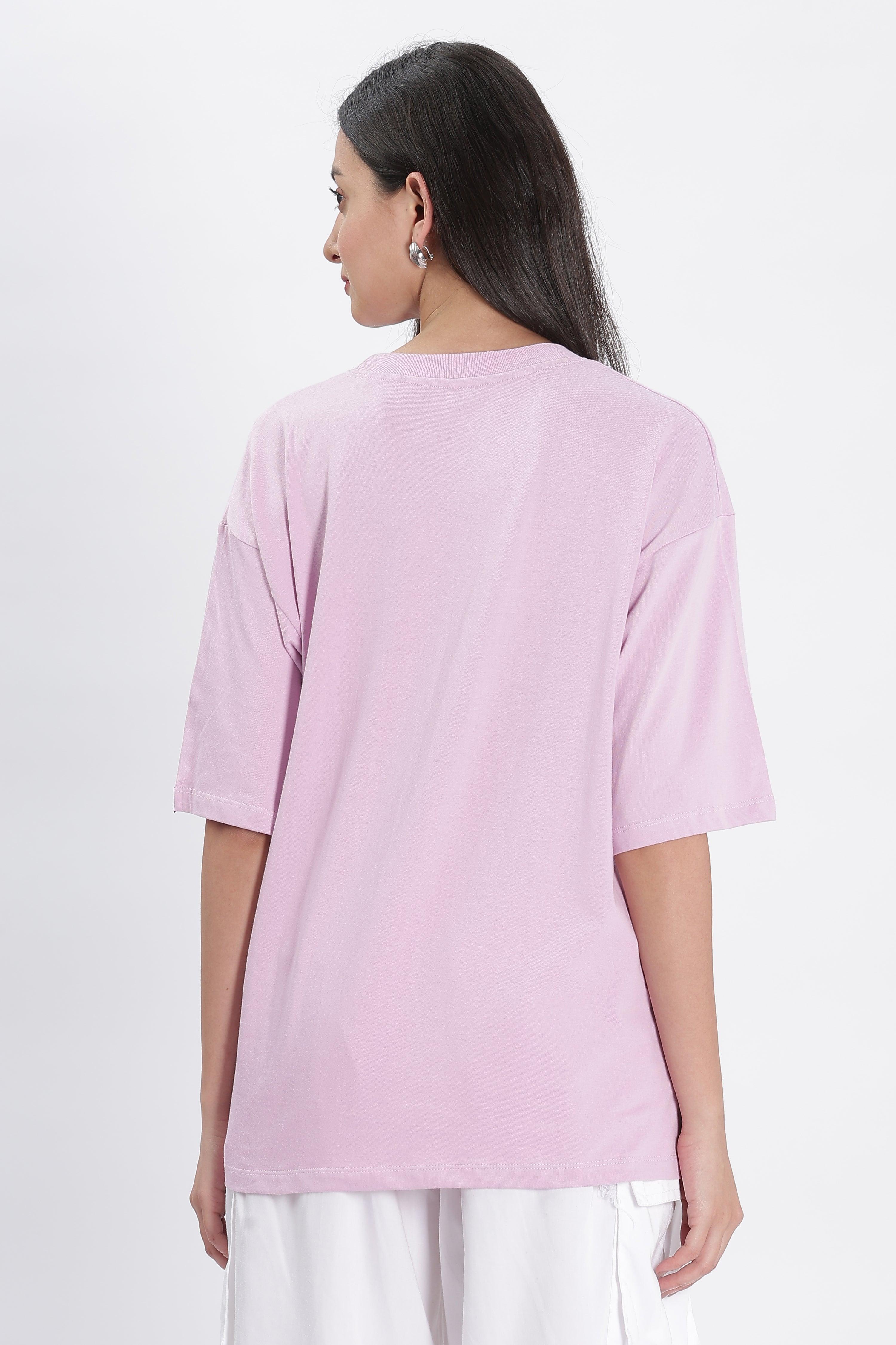 Soulmonk lavender oversized t-shirt worn by female model shown from back in casual style