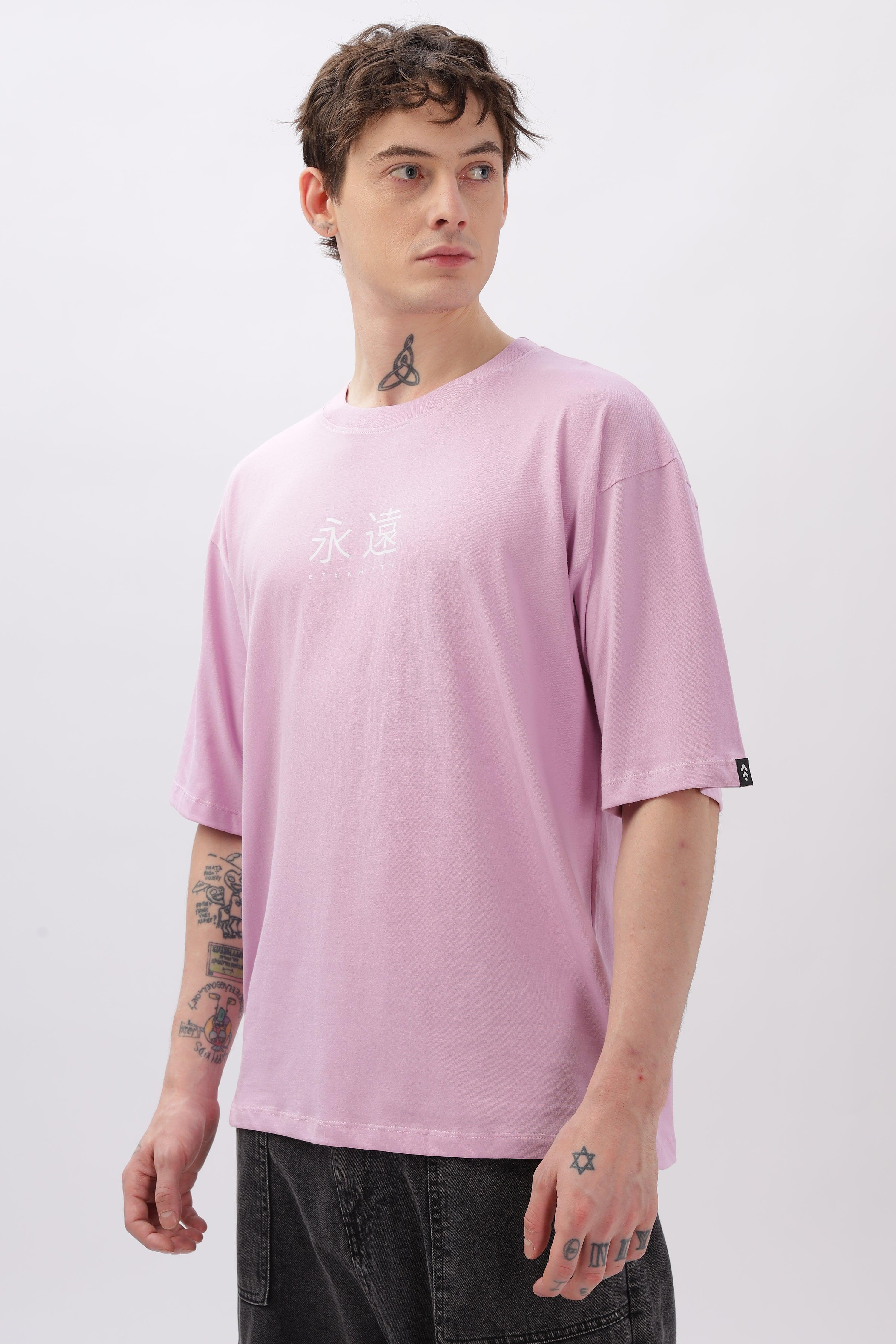 Soulmonk male model wearing lilac oversized t-shirt with white printed design and relaxed fit