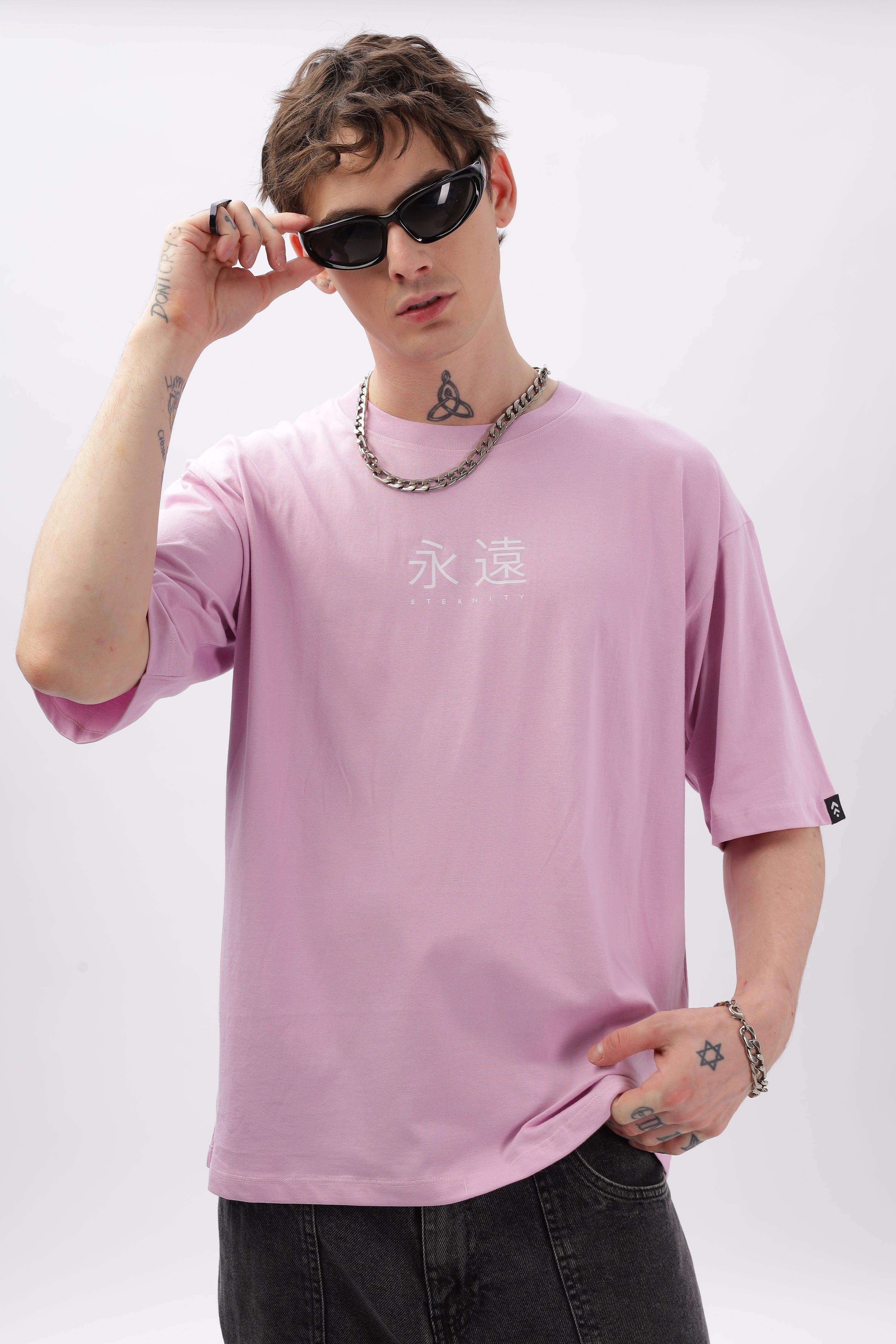 Soulmonk male model wearing lilac oversized t-shirt with white graphic and black sunglasses