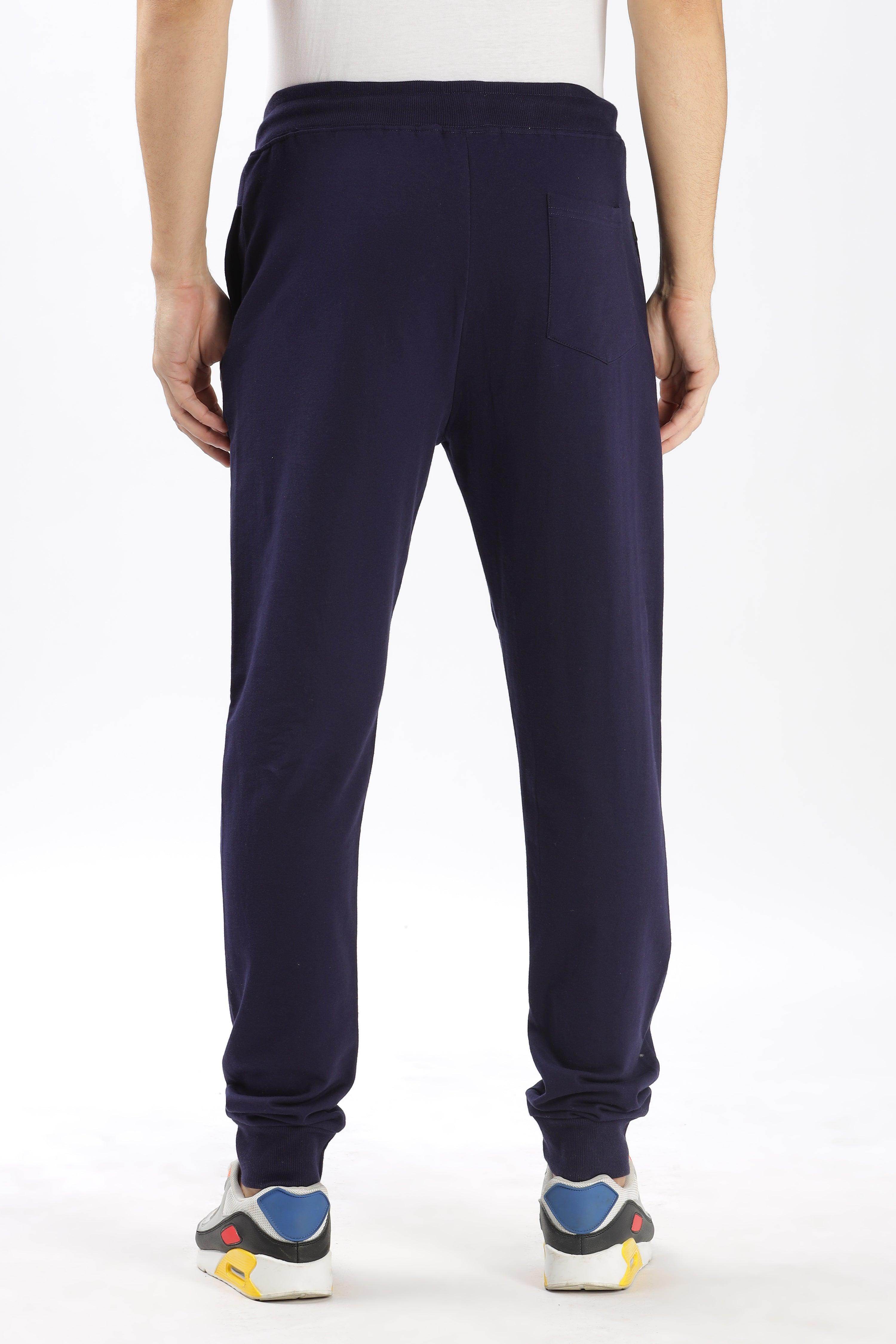 Soulmonk navy blue joggers for men shown from the back with elastic waistband and cuffed ankles