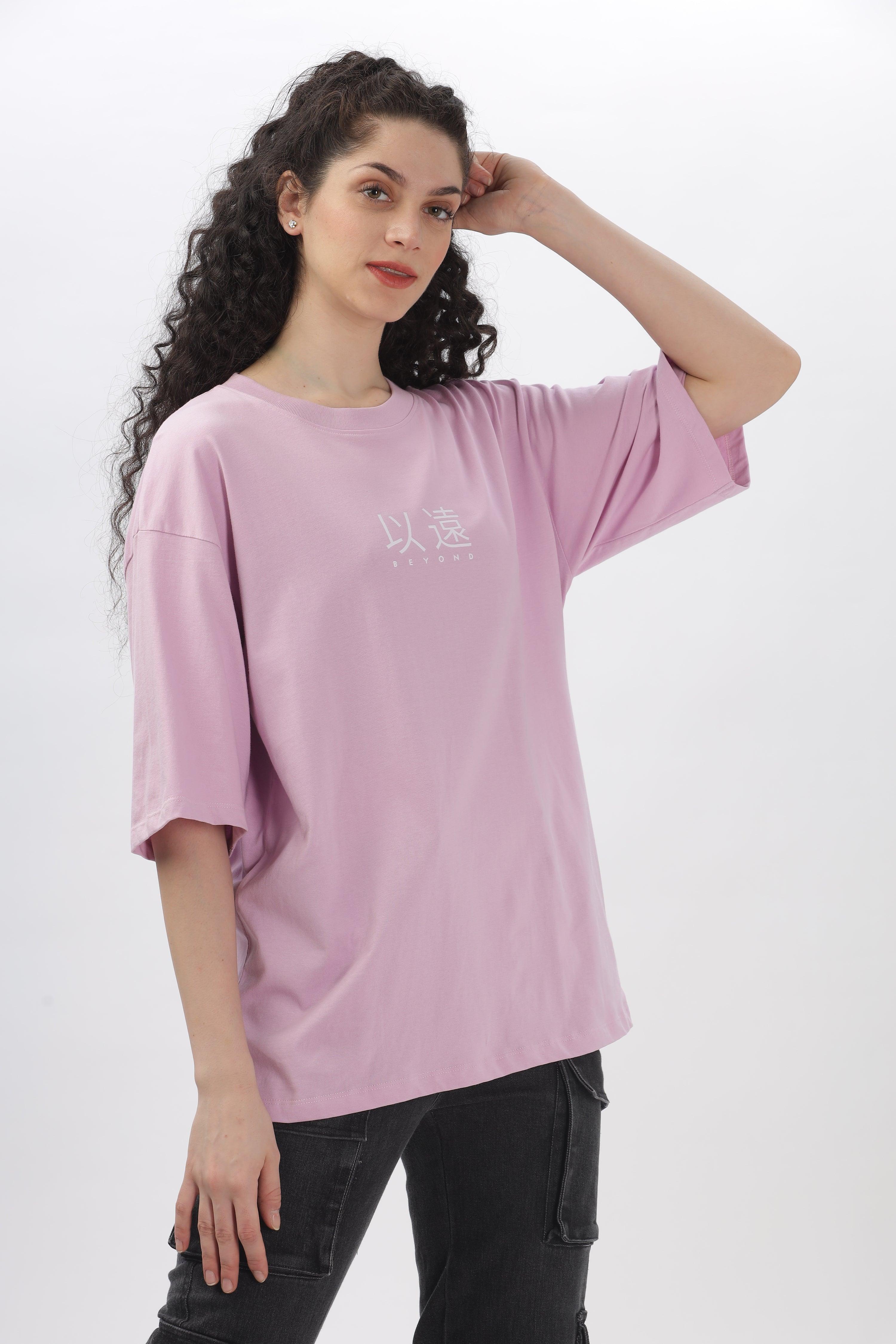Soulmonk oversized lavender t-shirt worn by woman with curly hair paired with black pants