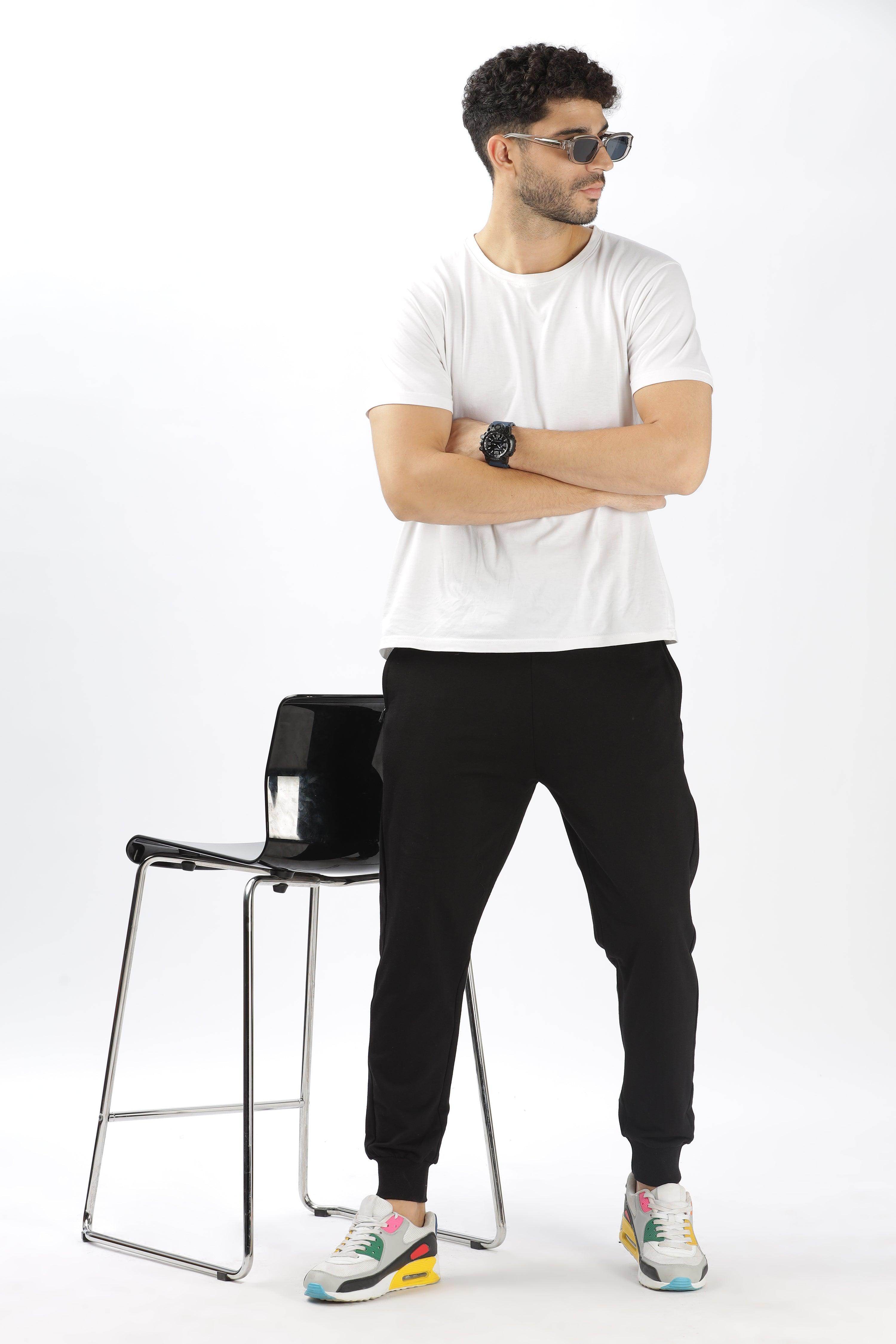 Soulmonk premium black joggers men worn by model with white t-shirt and sneakers