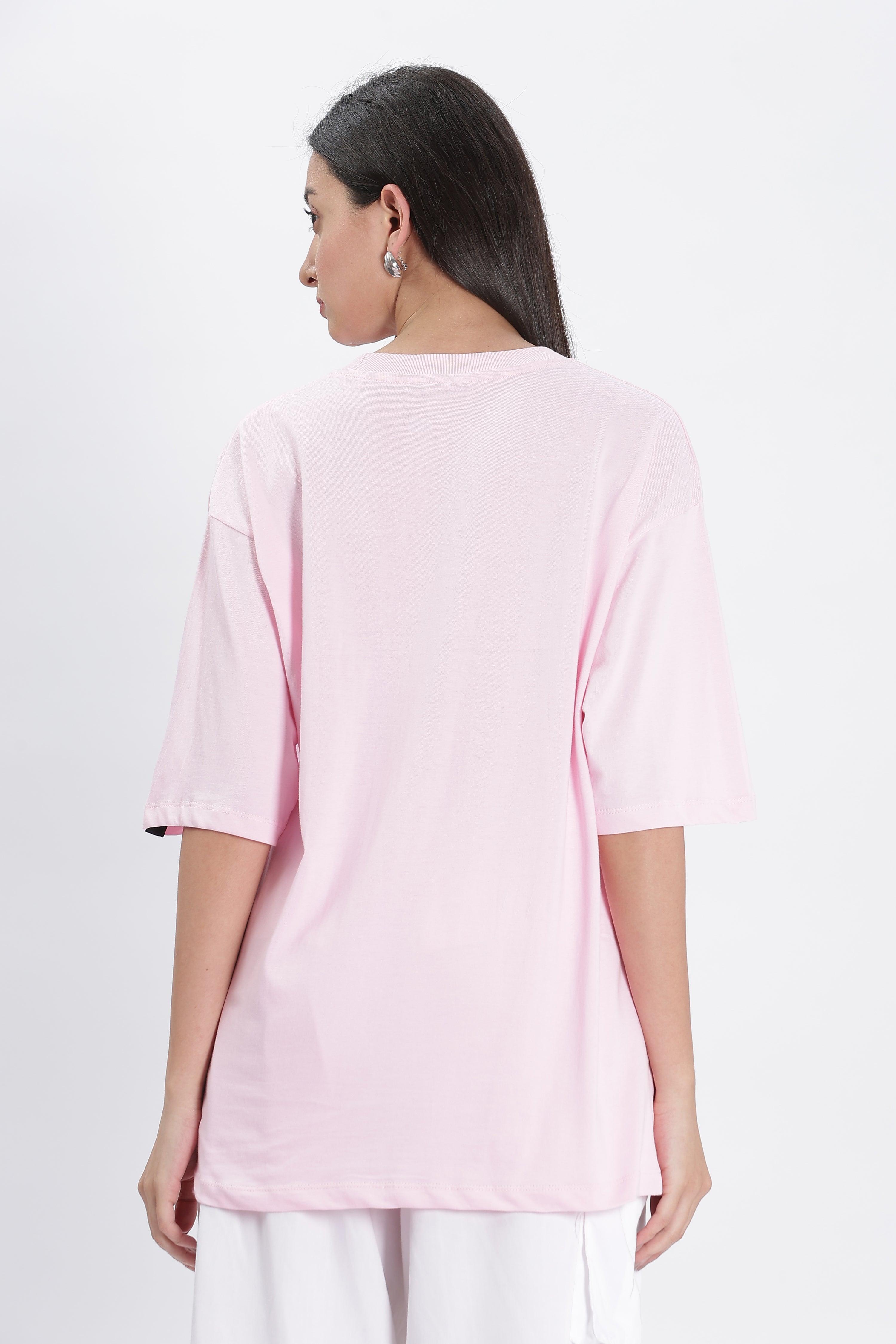 Soulmonk soft pink oversized t-shirt worn by female model shown from the back