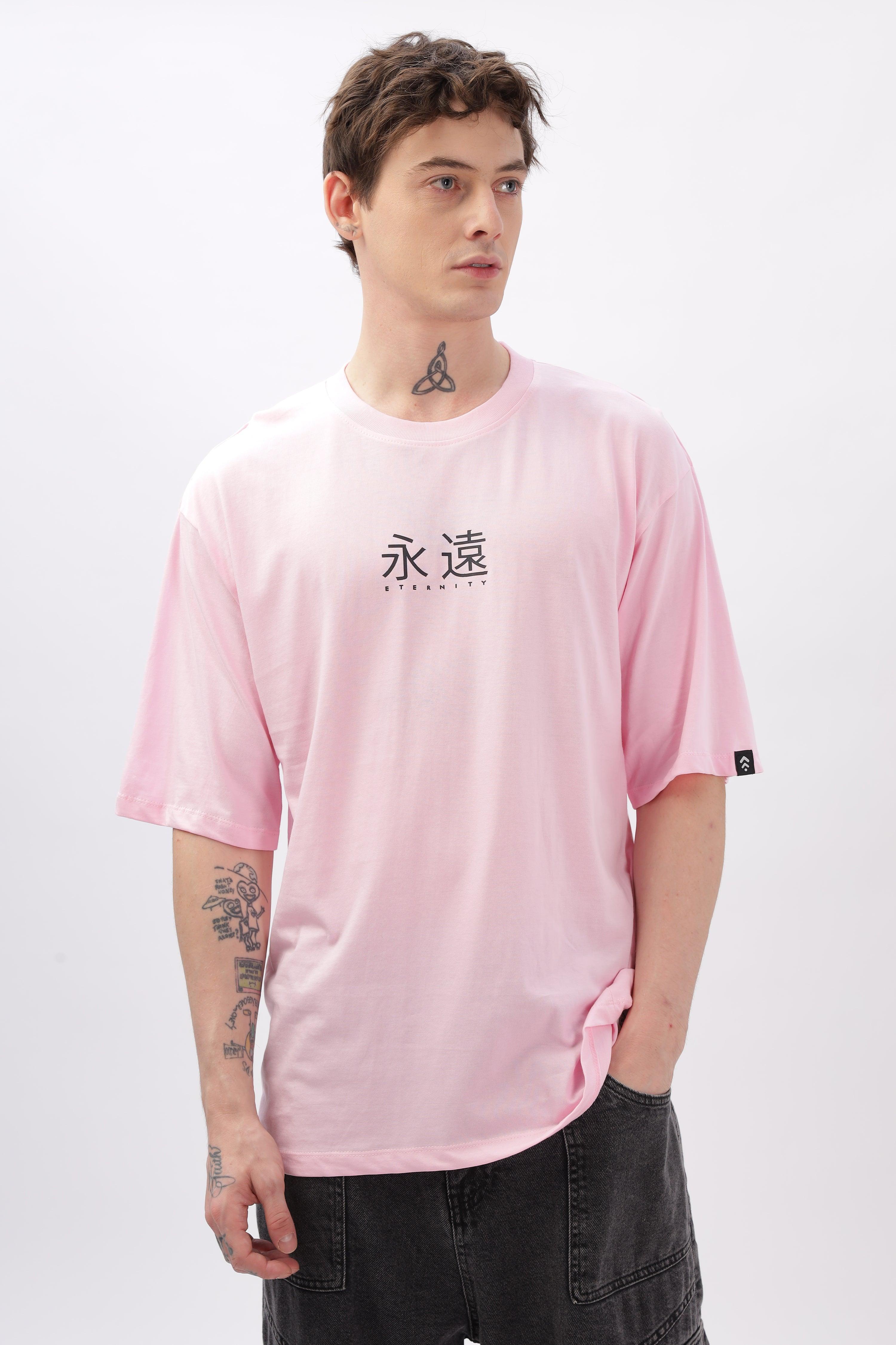 Soulmonk soft pink oversized t-shirt with black kanji print worn by male model with tattoos