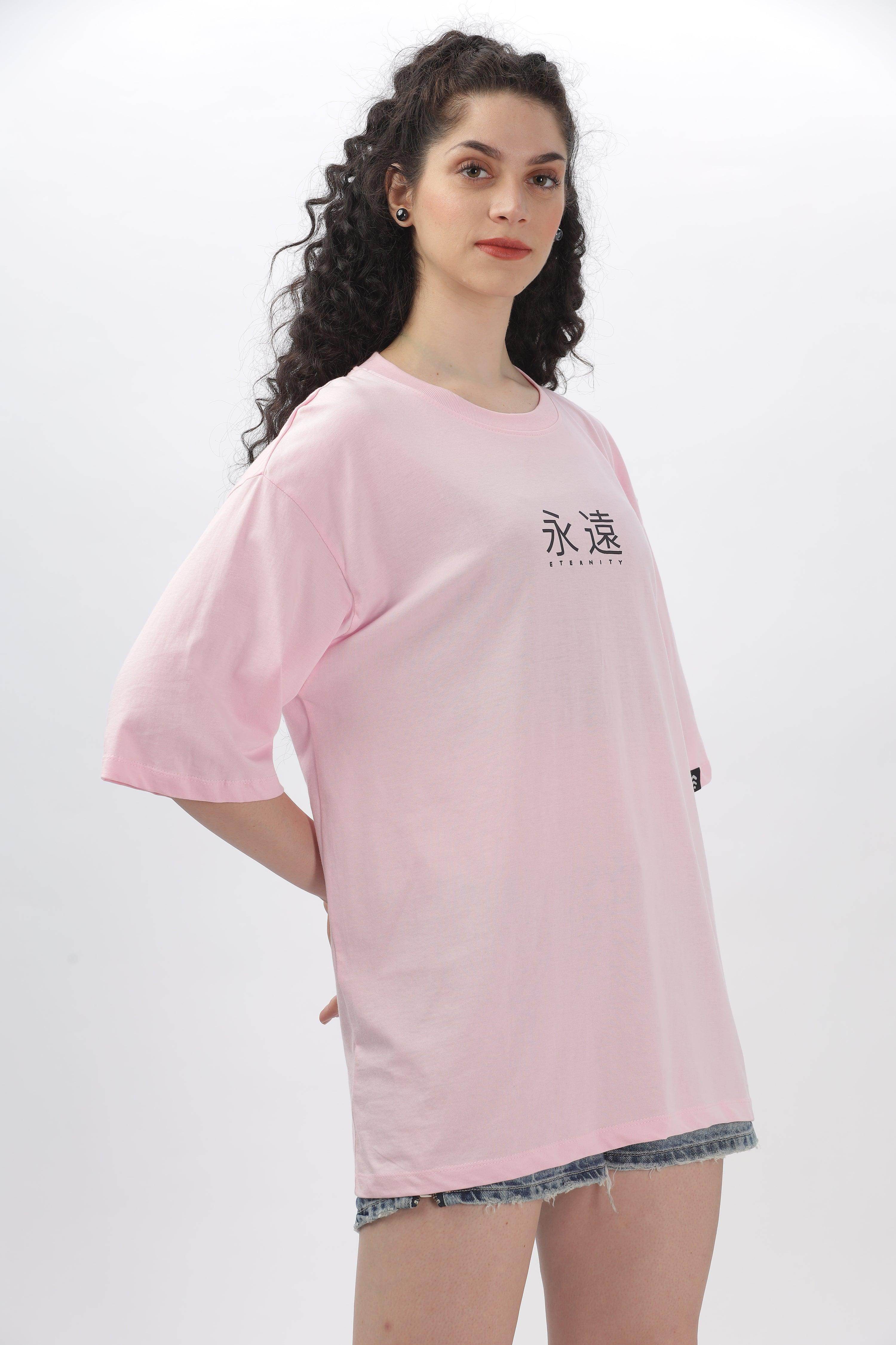 Soulmonk soft pink oversized t-shirt worn by female model with graphic text on front