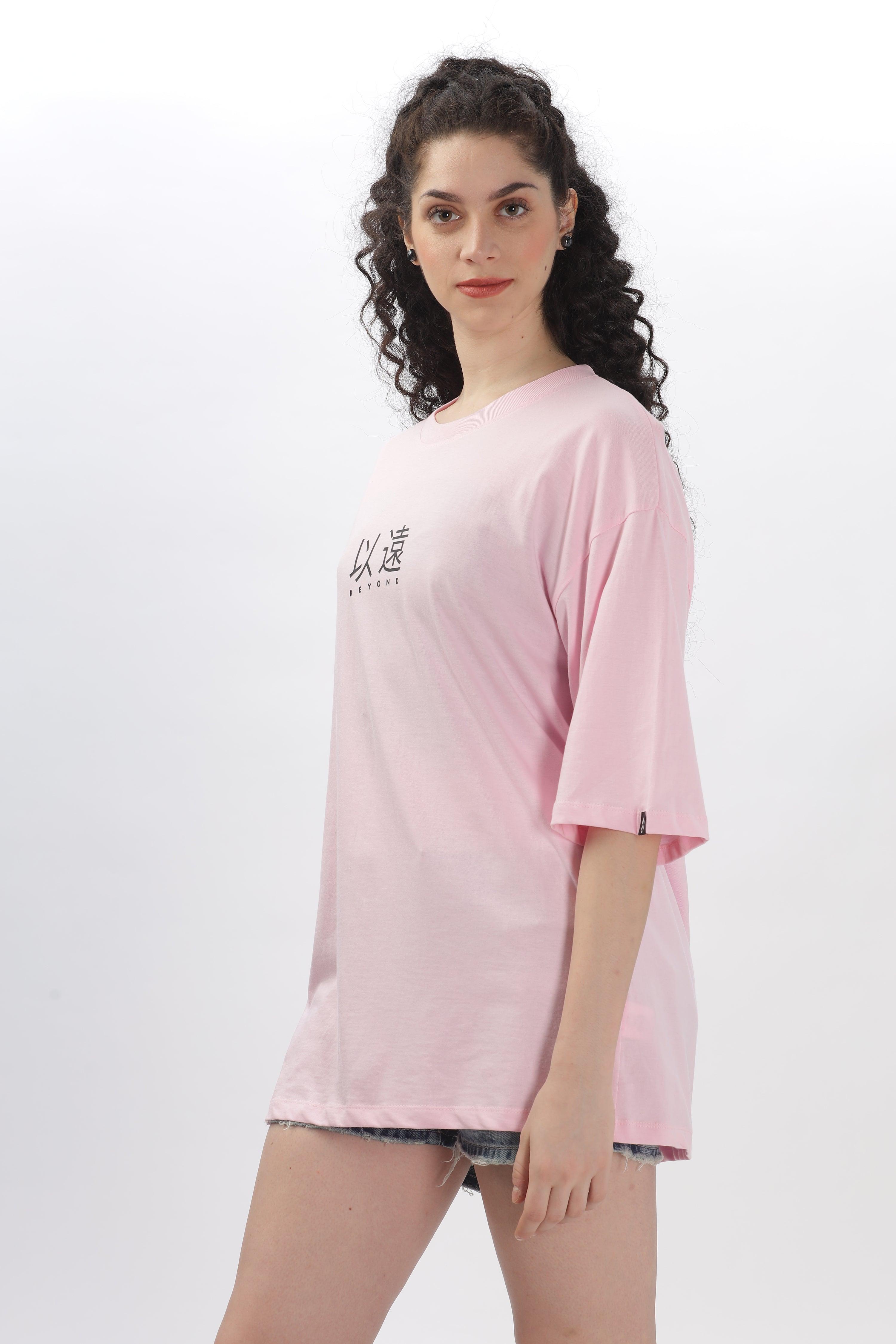 Soulmonk soft pink oversized t-shirt worn by female model with curly hair and casual look