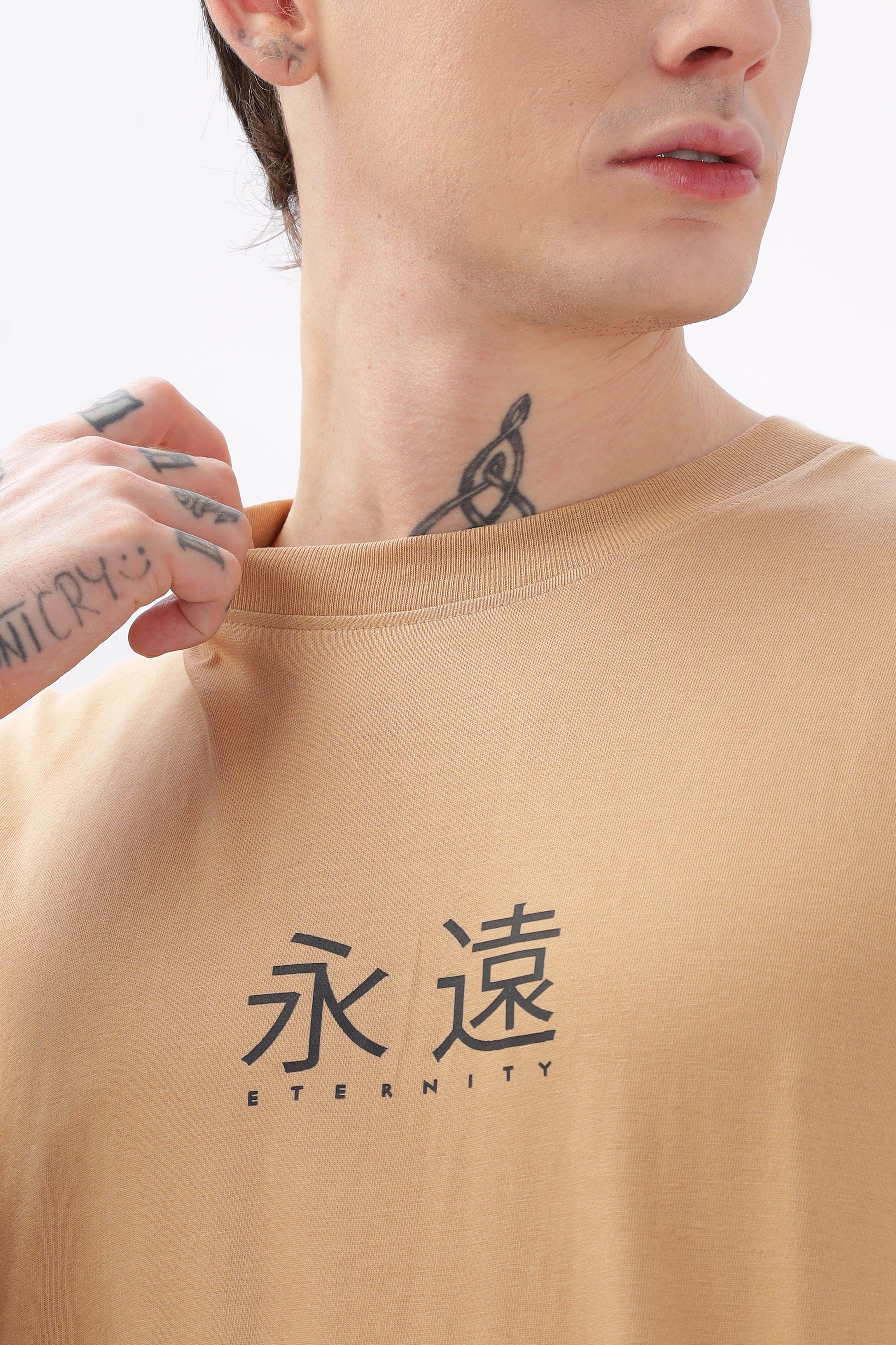 Soulmonk taupe oversized t-shirt with eternity graphic and tattooed male model close-up