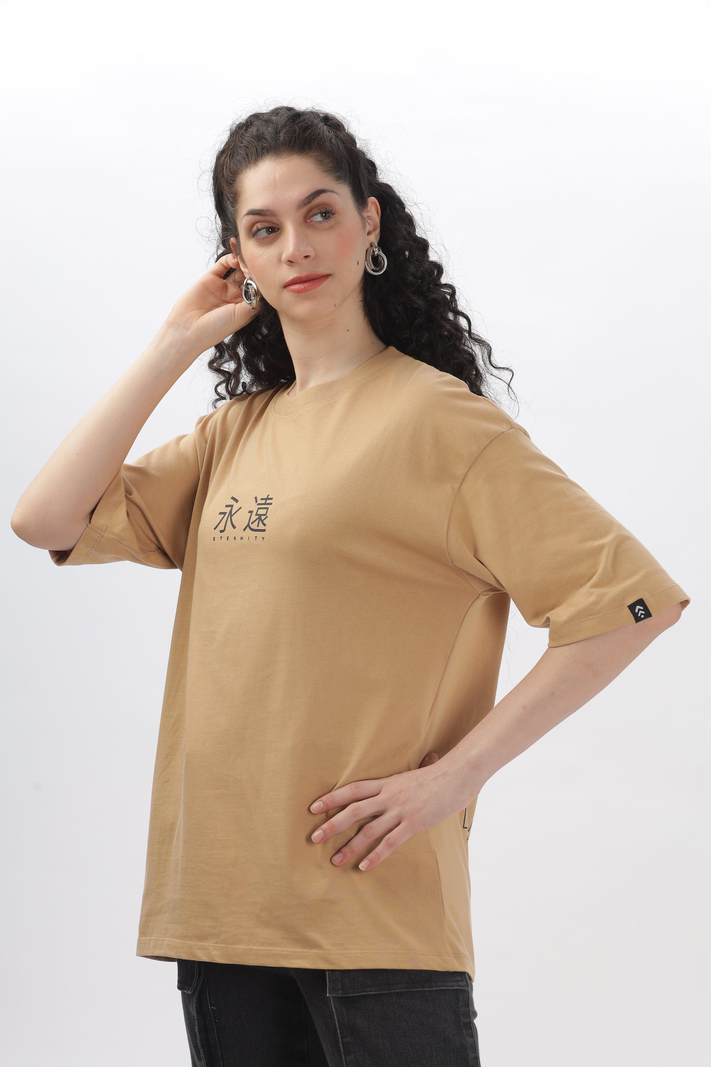 Female model wearing taupe oversized t-shirt by Soulmonk with printed design and relaxed fit