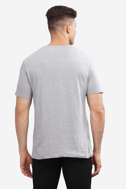 Male model wearing asphalt grey relaxed fit t-shirt by Soulmonk shown from the back
