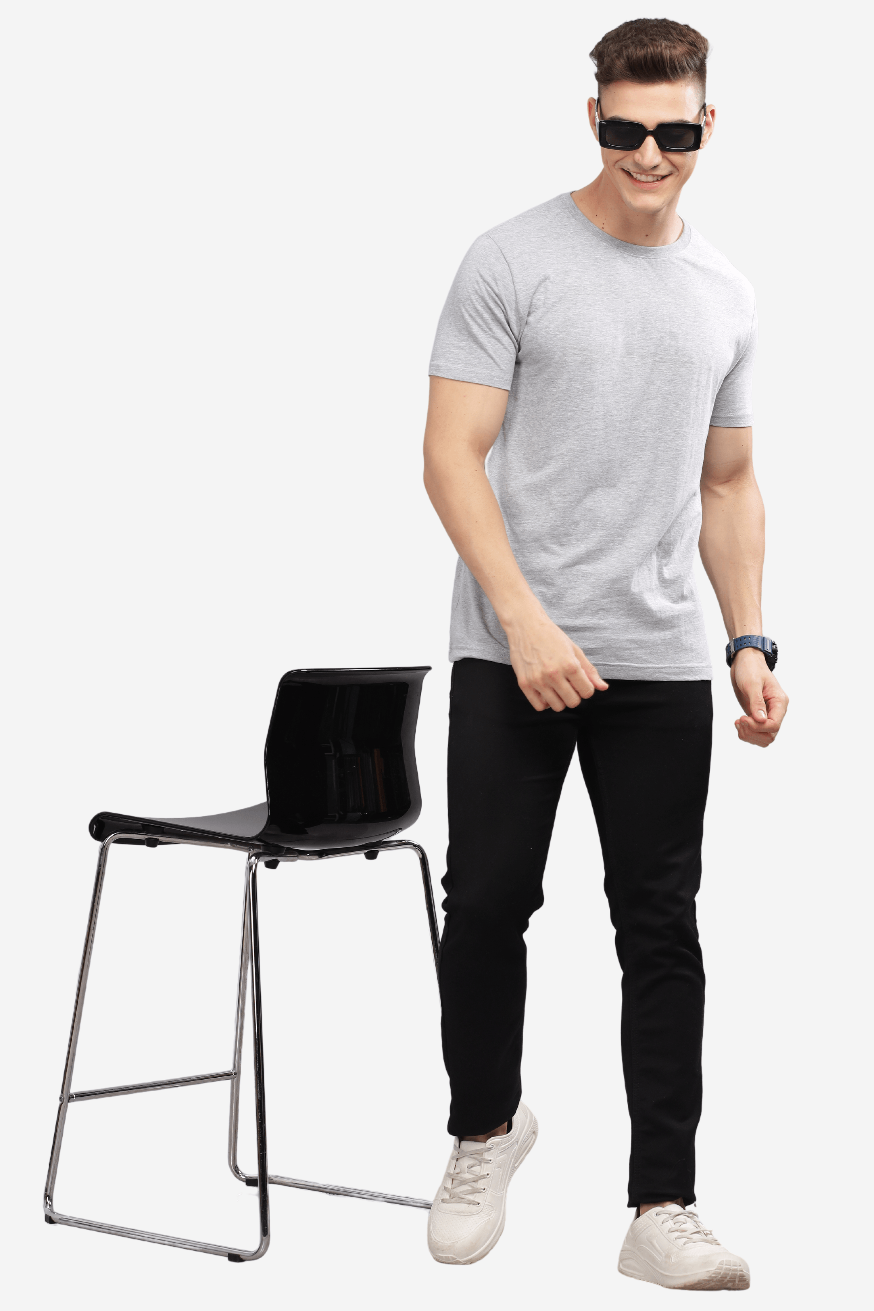 Male model wearing Soulmonk asphalt grey relaxed fit t-shirt with black pants and white sneakers