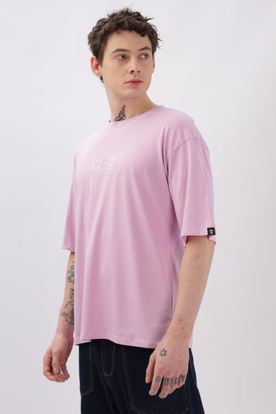 Male model wearing Soulmonk oversized lilac t-shirt with short sleeves and relaxed fit