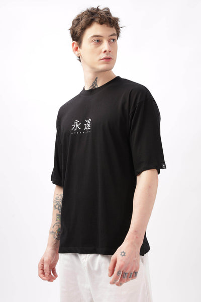 Soulmonk black oversized t-shirt for men with white graphic print worn by male model
