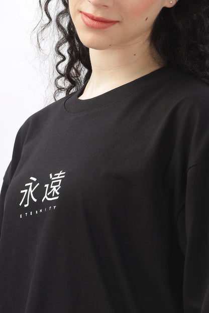 Soulmonk black oversized t-shirt for women with white eternity text and relaxed fit on female model