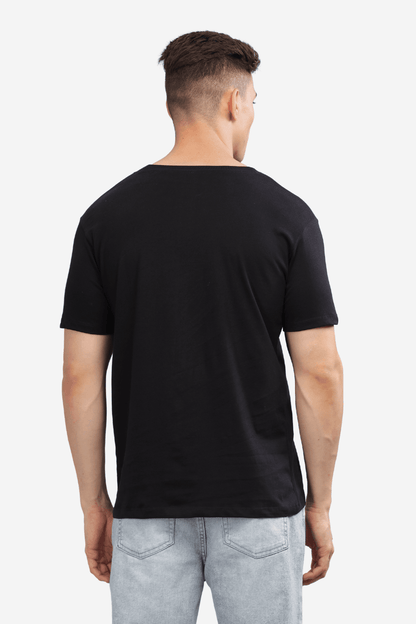 Soulmonk black relaxed fit t-shirt men shown from back on male model with light denim jeans