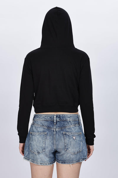Soulmonk black crop hoodie for women shown from the back with hood up paired with denim shorts