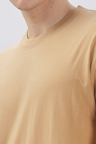 Soulmonk taupe oversized t-shirt worn by male model showing crew neckline and relaxed fit