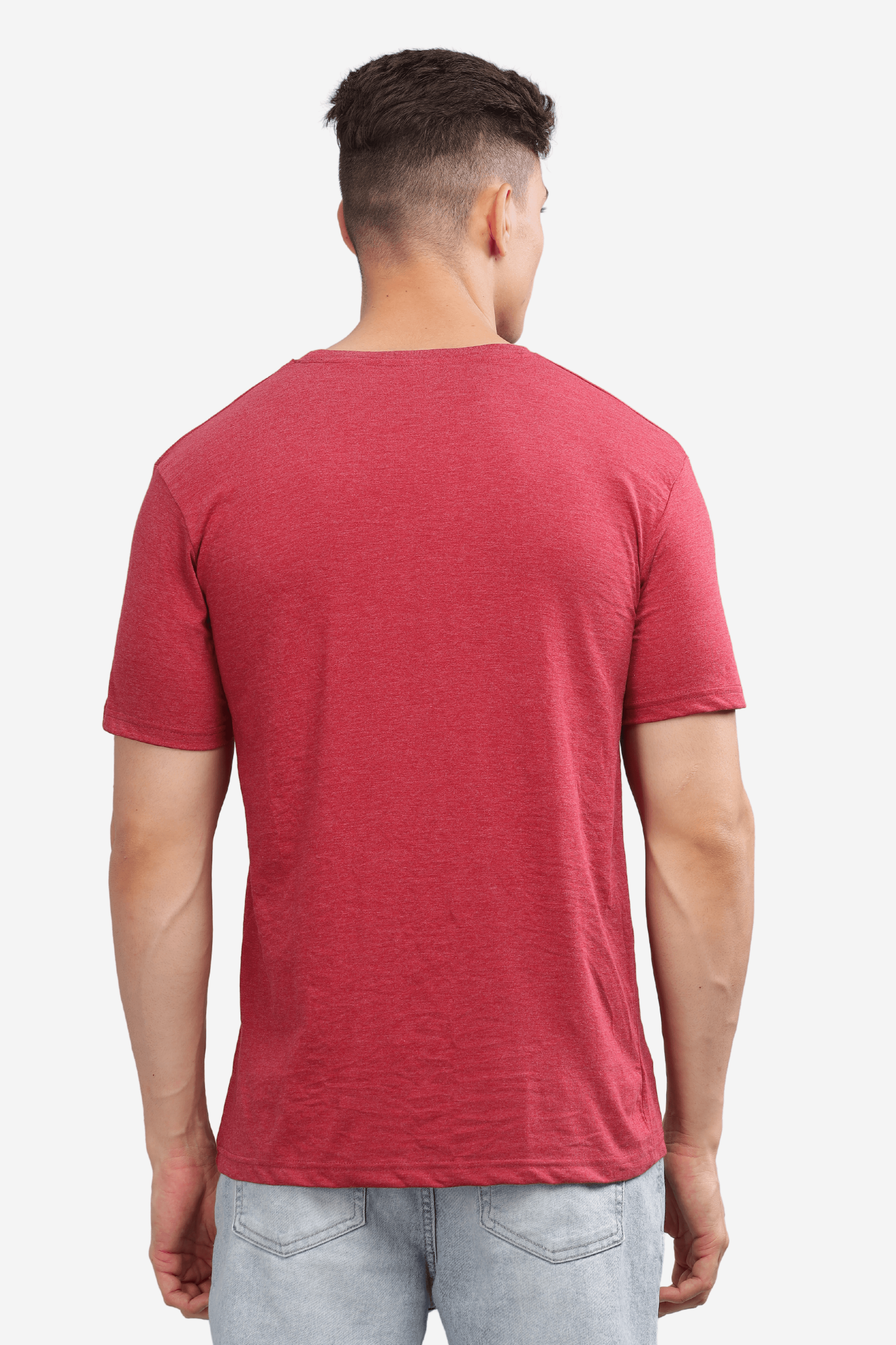 Back view of male model wearing cardinal red casual t-shirt with short sleeves and crew neck