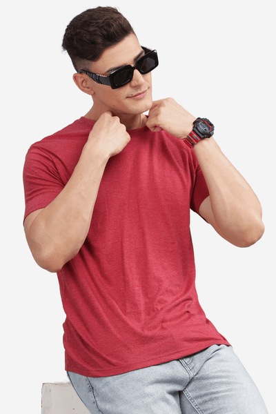 Male model wearing cardinal red casual t-shirt from Soulmonk with black sunglasses and wristwatch