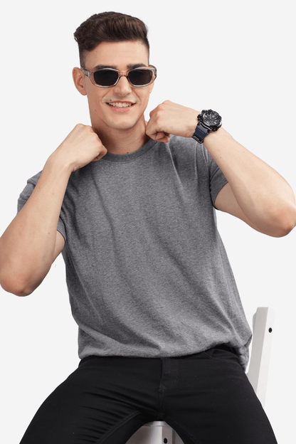 Male model wearing a Soulmonk dark grey relaxed fit t-shirt with black pants and sunglasses