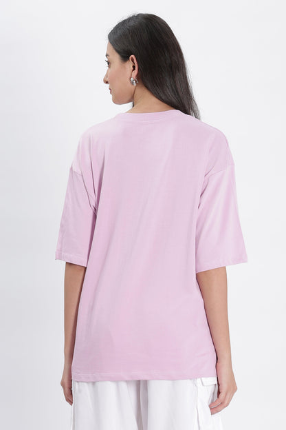 Soulmonk lavender oversized t-shirt worn by female model shown from back in casual style