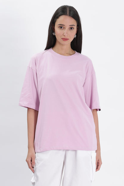 Female model wearing Soulmonk lavender oversized t-shirt with half sleeves and round neck