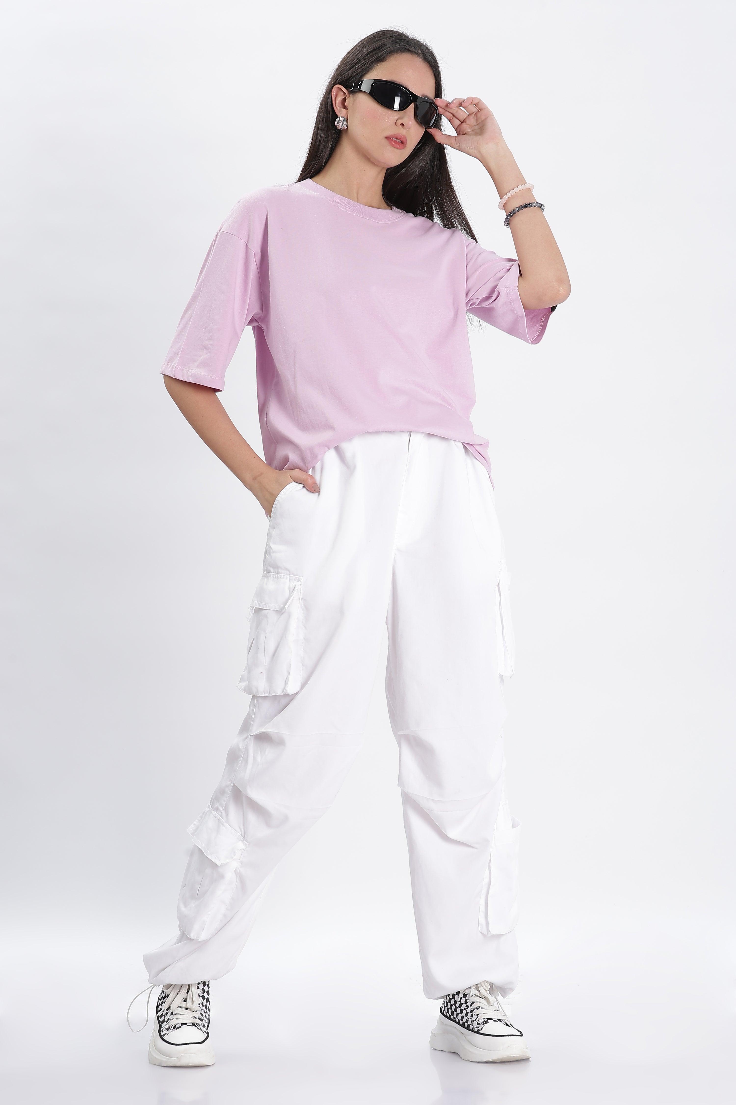 Soulmonk female model wearing lavender oversized t-shirt paired with white cargo pants and sneakers