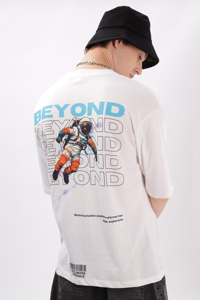 Soulmonk oversized white t-shirt men with astronaut graphic and beyond text on the back worn by male model