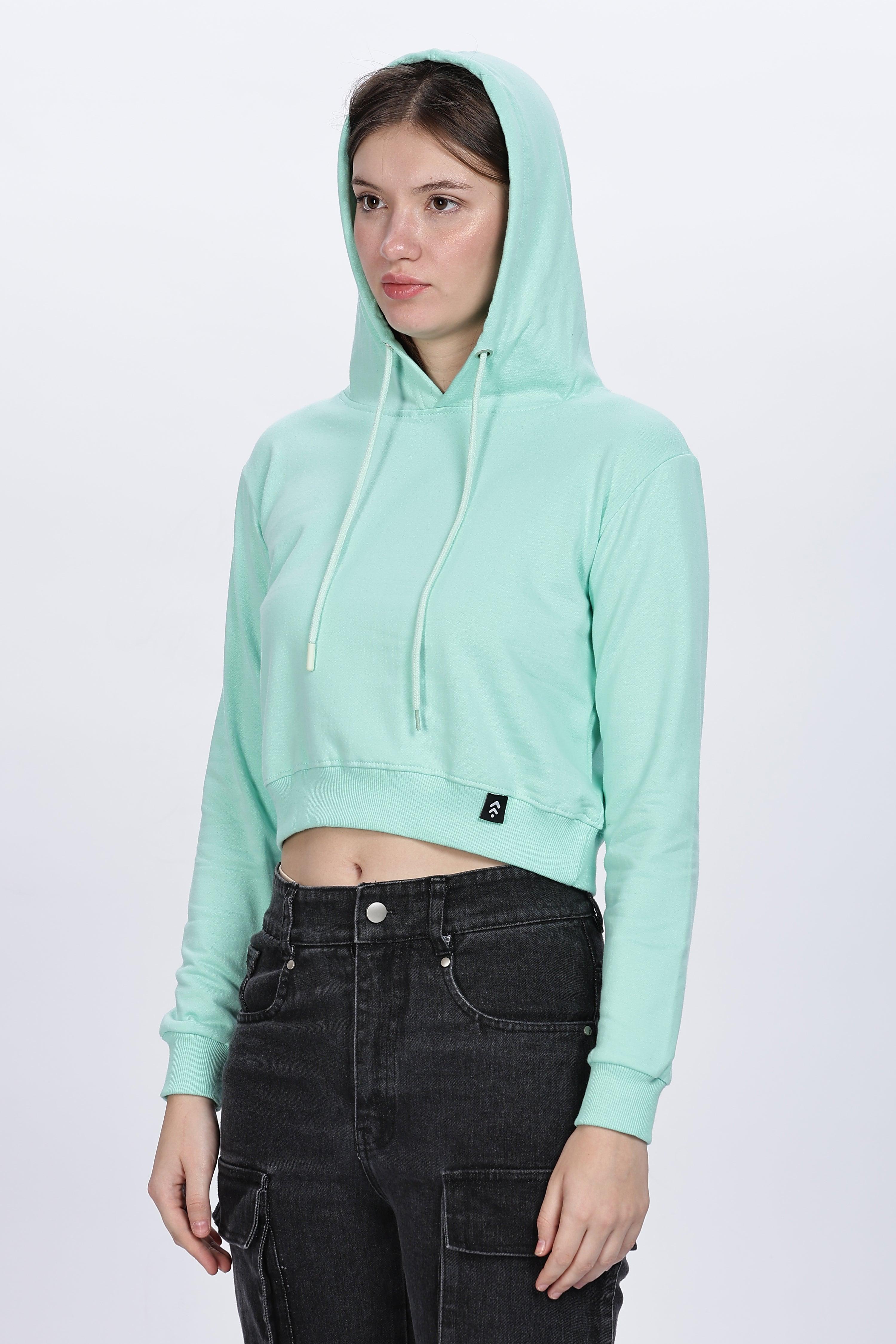 Soulmonk female mint crop hoodie with hood and long sleeves styled with black pants