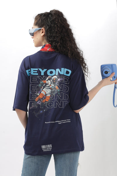 Soulmonk navy blue oversized t-shirt with astronaut graphic design on back worn by woman