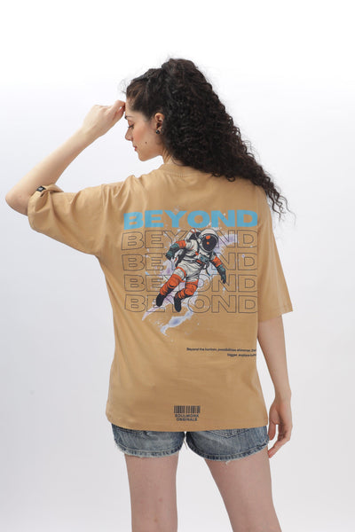 Soulmonk oversized taupe t-shirt with astronaut graphic worn by female model with curly hair