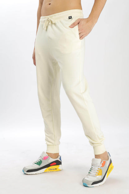Soulmonk pear sorbet joggers in light cream color with drawstring waist and cuffed ankles