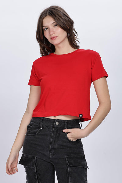 Soulmonk red solid crop top worn by female model with black cargo pants