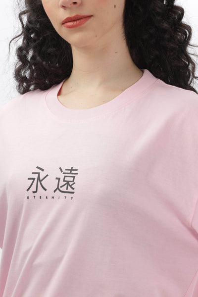 Soulmonk soft pink oversized t-shirt with eternity text and Japanese characters worn by female model