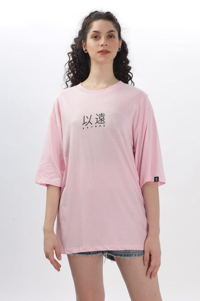 Soulmonk soft pink oversized t-shirt worn by female model with black text design on front