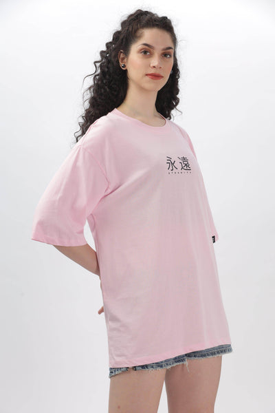 Soulmonk soft pink oversized t-shirt worn by female model with graphic text on front