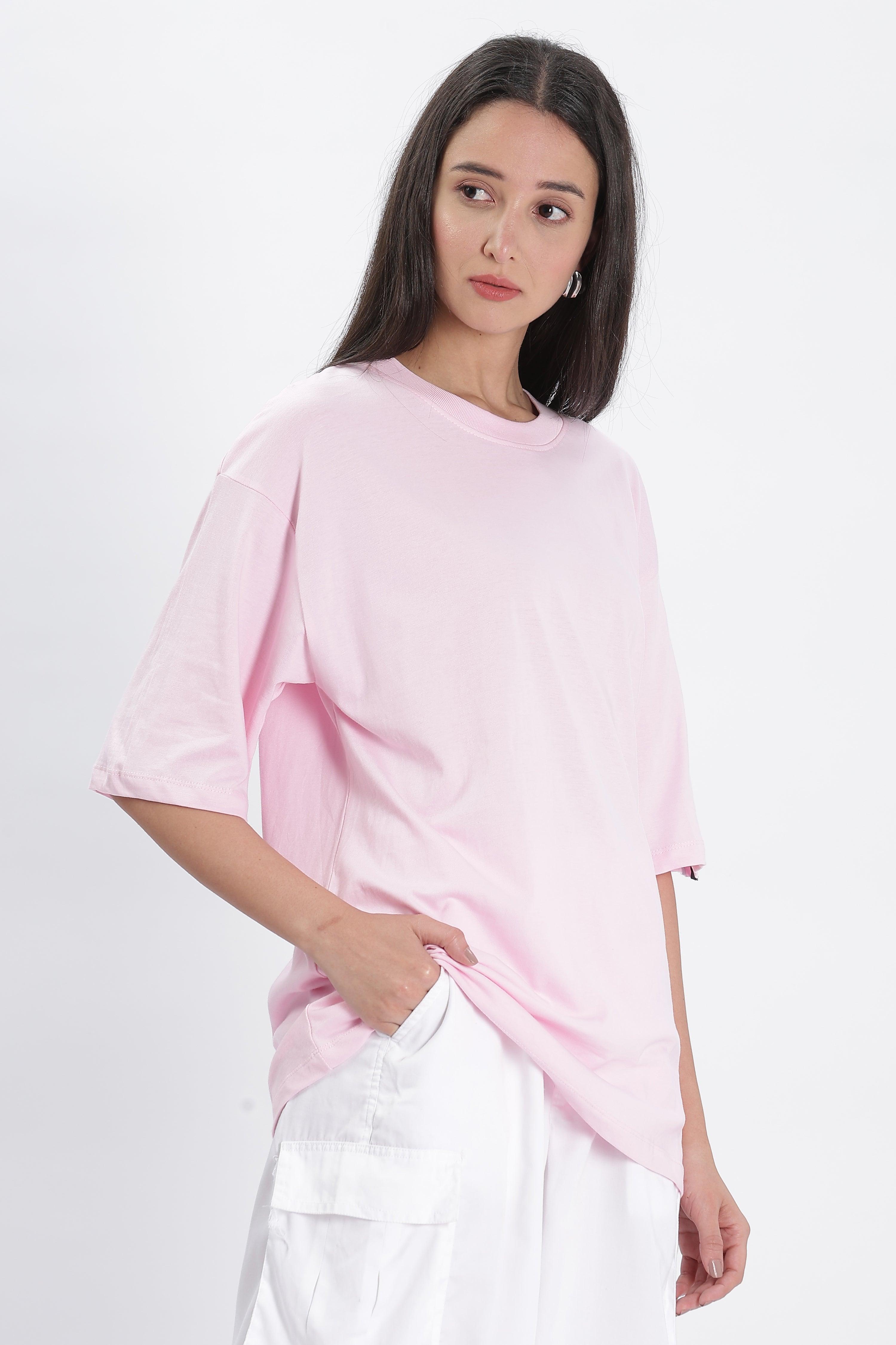 Soulmonk soft pink oversized t-shirt worn by female model paired with white cargo pants