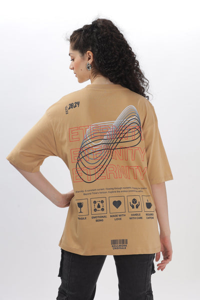 Female model wearing Soulmonk taupe oversized t-shirt with graphic and text design on back