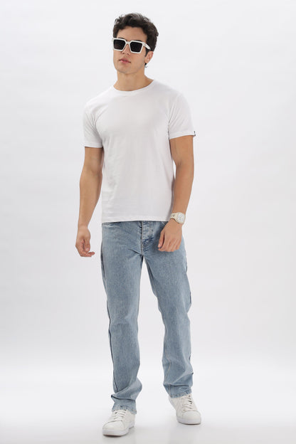 White relaxed fit t-shirt men by Soulmonk worn with light blue jeans and white sneakers